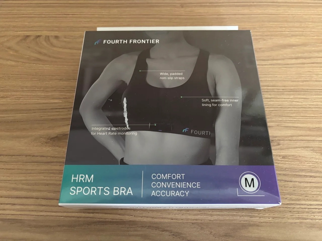 The packaging of our Fourth Frontier HRM Sports Bra sample, labelled size Medium.