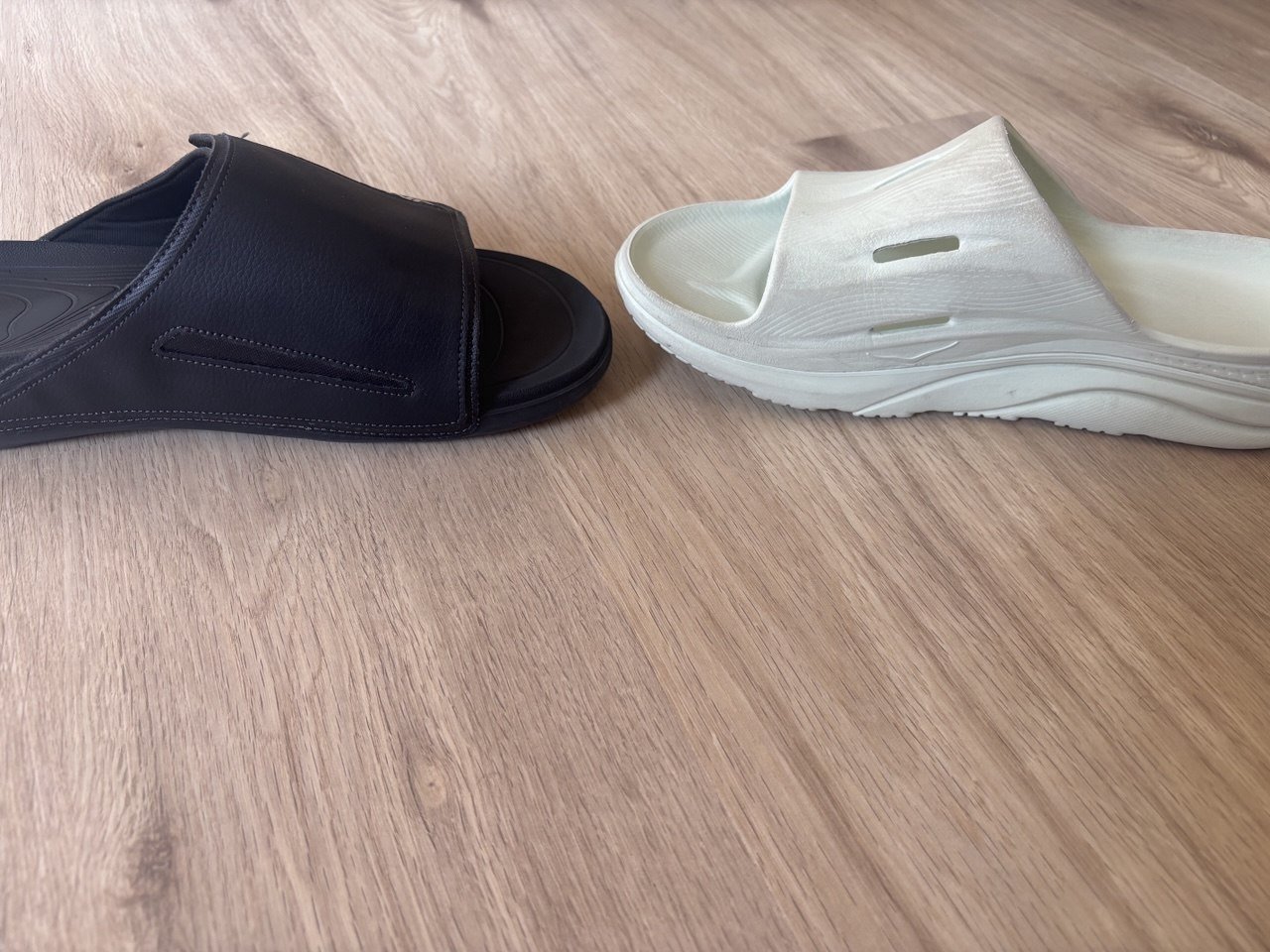 Side profile of VALSOLE Recovery Slide beside HOKA ORA Recovery Slide 3.
